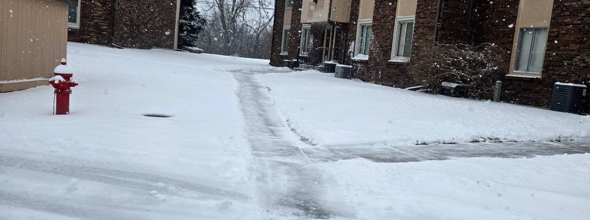 Drive lane through the property cleared after snowfall